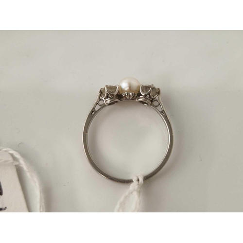 311 - A DIAMOND AND PEARL PLATINUM SET RING WITH GOOD DIAMONDS SIZE R 2.9 GMS