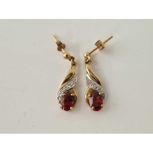 315 - Two pairs of earrings ruby and garnet both 9ct