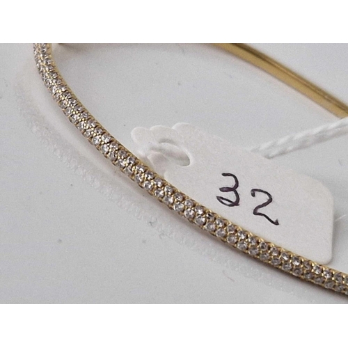 32 - A SMALL DIAMOND BANGLE 18CT GOLD 6.2 GMS 5CM DIAMETER