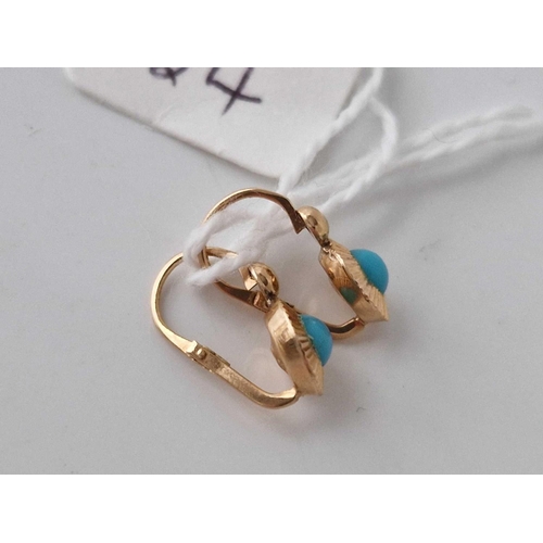 34 - A pair of gold turquoise earrings