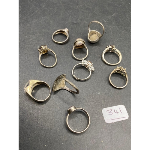 341 - Ten vintage silver rings