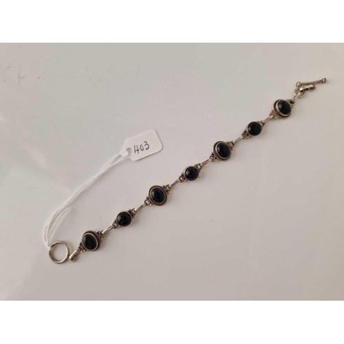 403 - A silver black stone set bracelet 7.5 inch