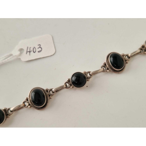 403 - A silver black stone set bracelet 7.5 inch