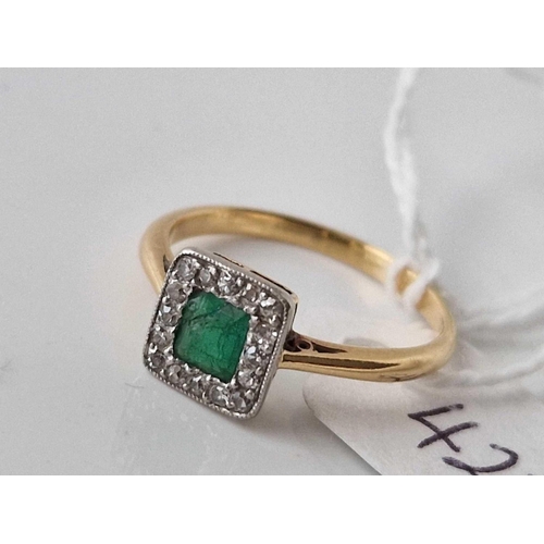 427 - A emerald and diamond ring 18ct gold size M 2.2 gms