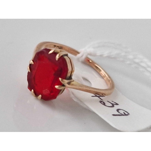 439 - A red stone ring 9ct size O 2  gms