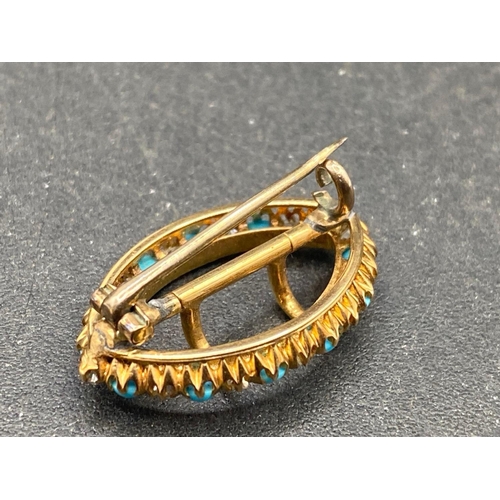 445 - A VICTORIAN DIAMOND AND TURQUOISE BROOCH DESIGNED AS A BUCKLE