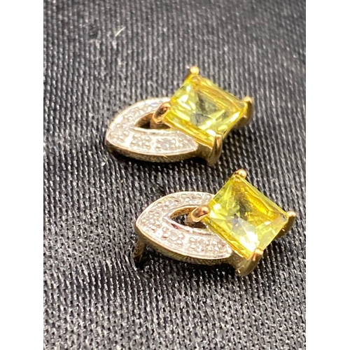 447 - A pair of intense yellow citrine and diamond earrings 9ct