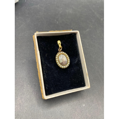 448 - A pretty Georgian glazed portrait pendant set with pearls 18ct gold with later portrait