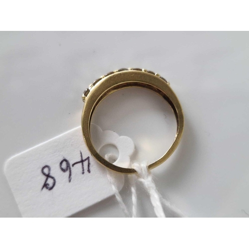 468 - A seven stone diamond ring 18ct gold size L 2.5 gms