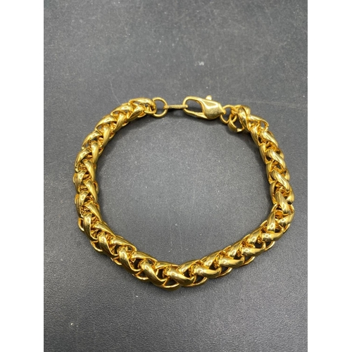 50 - A heavy designer linked bracelet with thick gold plating 8 inch