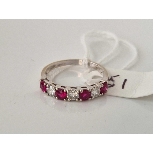 51 - A WHITE GOLD RUBY AND DIAMOND HALF ETERNITY RING 18CT GOLD APPROX 0.50 CARATS SIZE O 2.7 GMS BOXED