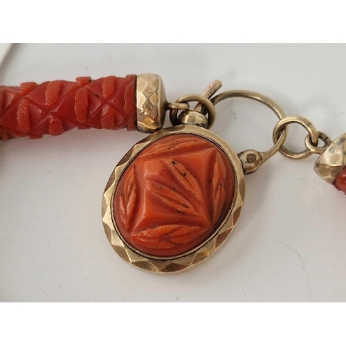 53 - A VICTORIAN CARVED CORAL AND GOLD BRACELET WITH PADLOCK CLASP 7 INCH BOXED