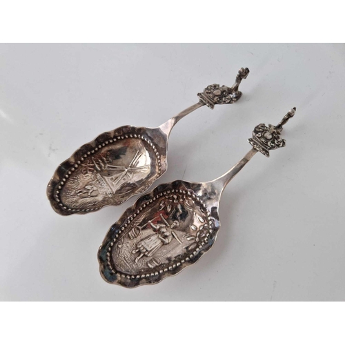 881 - Two 19th Century Dutch caddy spoons with embossed bowls