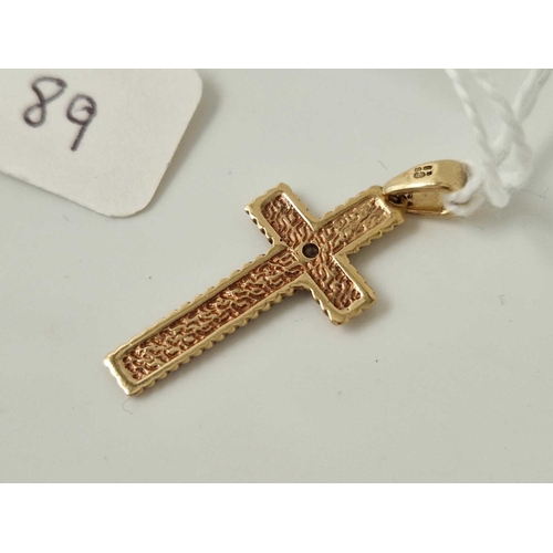 89 - A cross pendant with diamond 9ct 1.5 gms