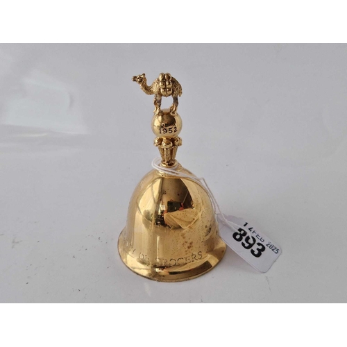 893 - Silver gilt commemorative table bell surmounted with a camel from the worshipful company of Grocers.... 