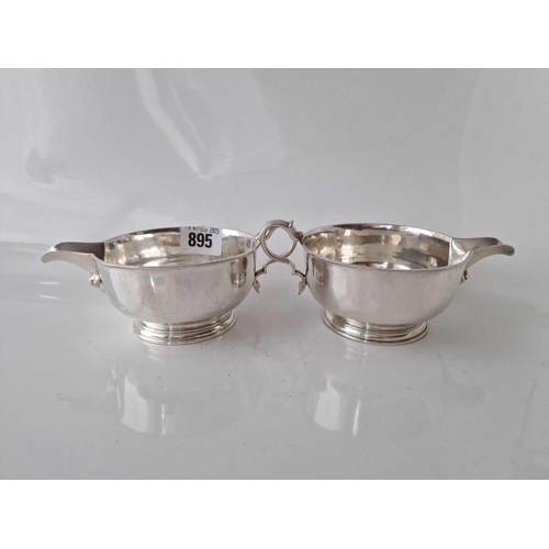 895 - Good pair of circular sauce boats, each on rim foot with hammered finish. 6.5 inch over handle . Lon... 