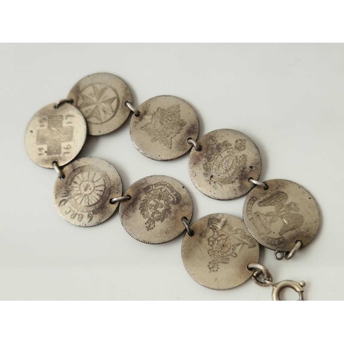 95 - A silver French coin bracelet etc.