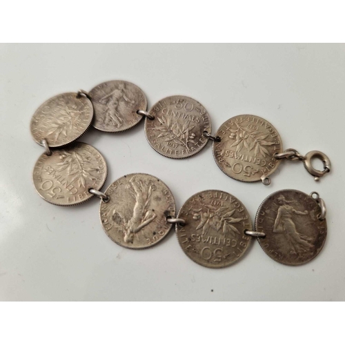 95 - A silver French coin bracelet etc.