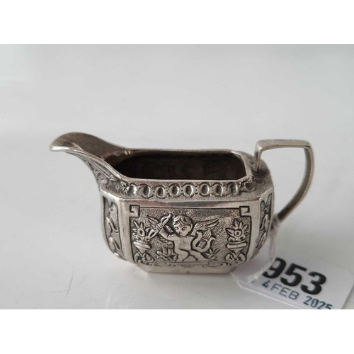 953 - Small Continental (900 standard) milk jug with chased decoration 3 inch long . 49Gms