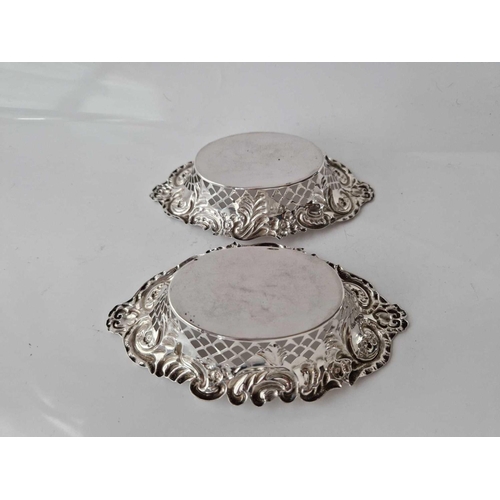 965 - Pair of boat shaped bonbon dishes also pierced and embossed. 6 inch long. Chester 1904 By H H.  75g