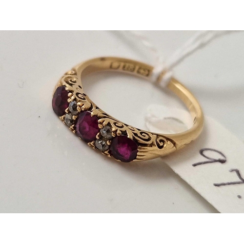 97 - A RUBY AND DIAMOND SEVEN STONE RING 18CT GOLD SIZE O 3.9 GMS