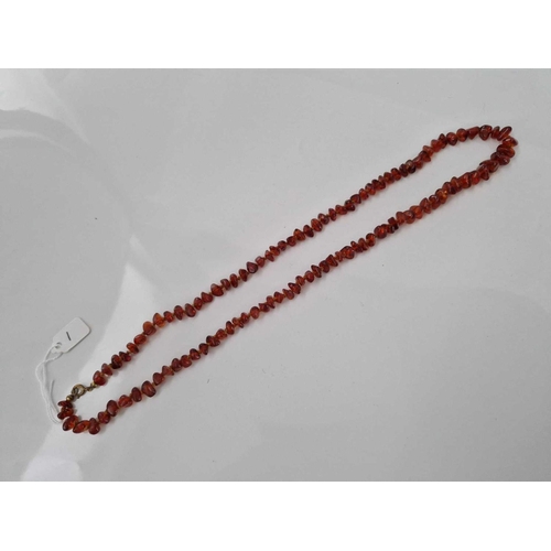 1 - A amber bead necklace 26 inch 27 gms