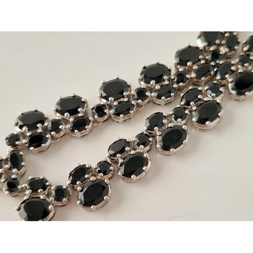 104 - A silver double row stone set necklace 16 inch 39 gms