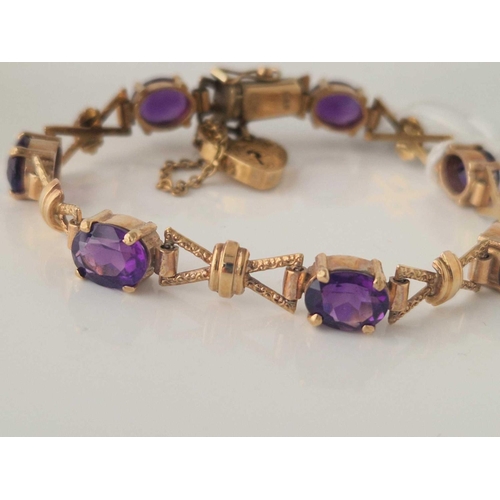 12 - A AMETHYST BRACELET 9CT 7 INCH 18 GMS