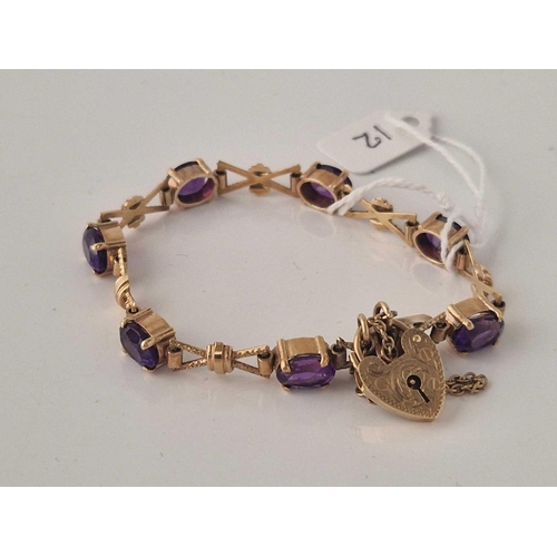 12 - A AMETHYST BRACELET 9CT 7 INCH 18 GMS