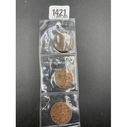 1421 - Three ancient Eastern copper coins