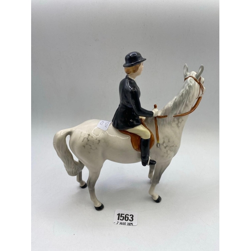 1563 - A Huntswoman on a grey horse