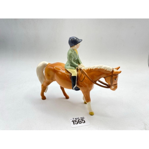 1565 - A Beswick young man on a Pony, 5.5