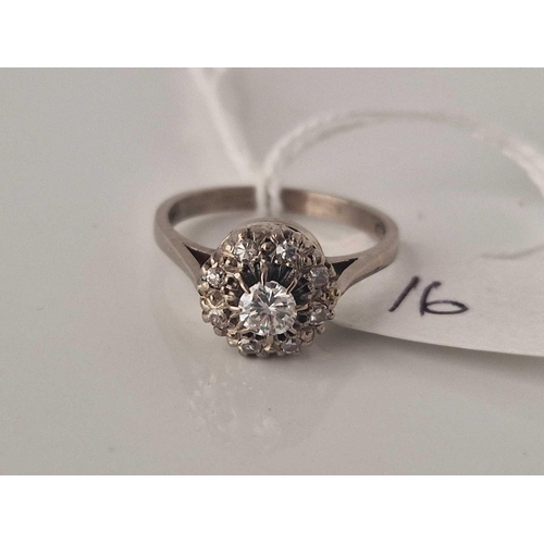 16 - A WHITE GOLD DIAMOND CLUSTER RING 18CT GOLD SIZE M 3.9 GMS