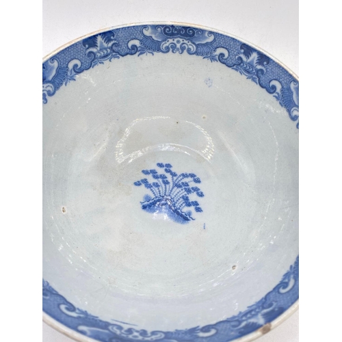 1616 - A Liverpool  Blue and white bowl with Chinese buildings 7.5 inches diameter