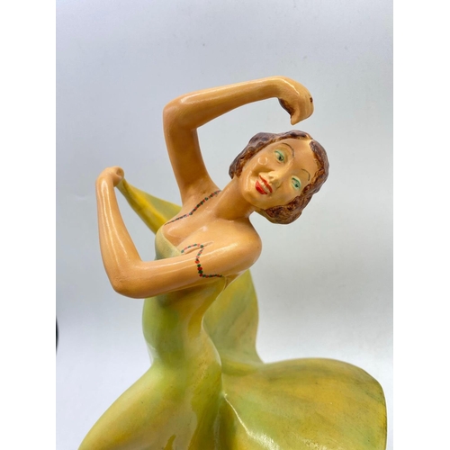 1618 - A art deco Wade figure in swirling long dress 10.5 inches high