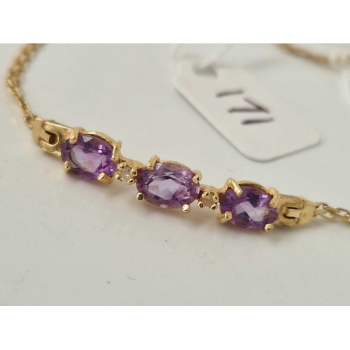 171 - A amethyst and diamond bracelet 14ct gold 6.5 inches 3.5 gms