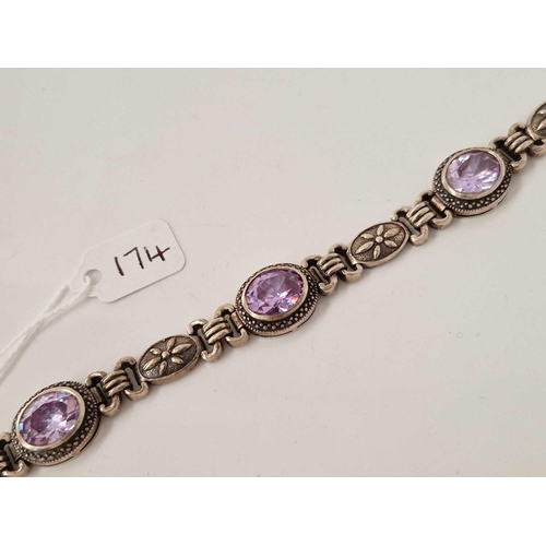 174 - A silver and purple stone bracelet 7.5 inch 33 gms