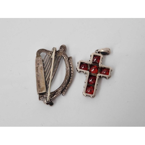 178 - A white metal red stone cross and Irish silver harp brooch Dublin