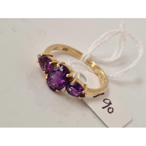 190 - A amethyst three stone ring 9ct size R 3 gms