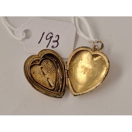 193 - A back and front heart locket 9ct