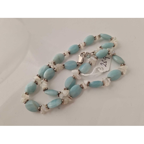 209 - A silver necklace with apatite coloured stones