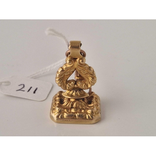 211 - A SOLID 18CT GOLD SEAL WITH 9CT CLIP 14.3 GMS