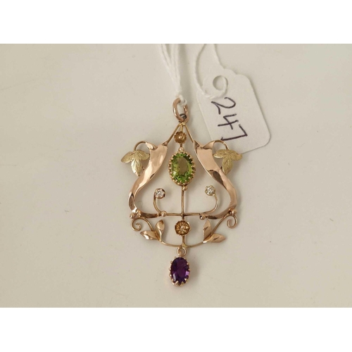 247 - A EDWARDIAN ART NOUVEAU SUFFRAGETTE PENDANT SET WITH AMETHYST DIAMONDS AND A PERIDOT 9CT