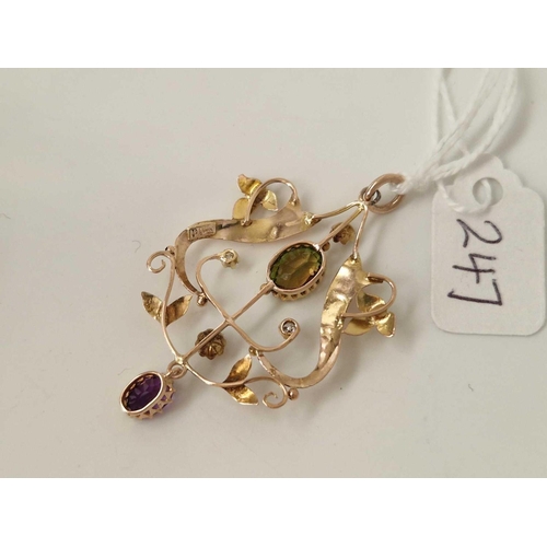 247 - A EDWARDIAN ART NOUVEAU SUFFRAGETTE PENDANT SET WITH AMETHYST DIAMONDS AND A PERIDOT 9CT