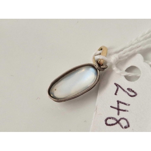 248 - A Edwardian moonstone silver set drop pendant with a gold bale