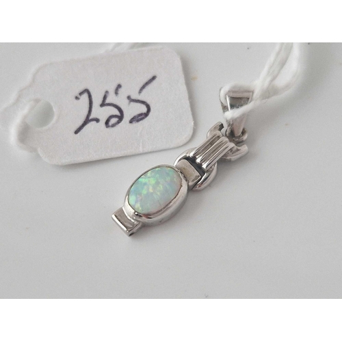 255 - A white gold and opal pendant 14ct gold 1.7 gms