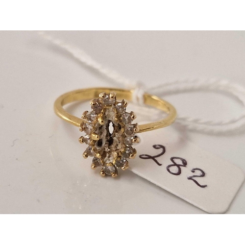 282 - A diamond ring with central stone missing 18ct gold size P 2.7 gms