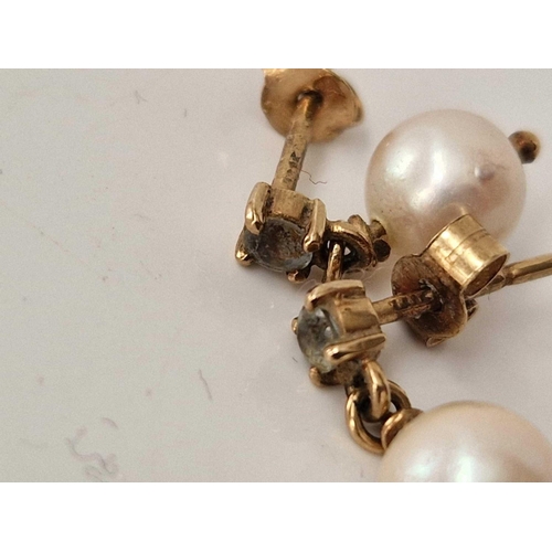 289 - A pair of pearl drop earrings 9ct