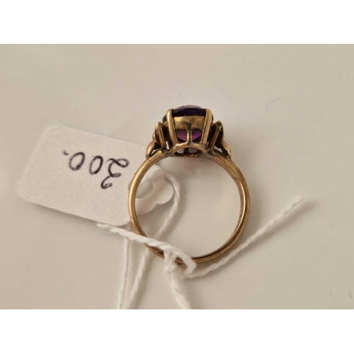 300 - A amethyst set ring 14ct gold size R 3.2 gms