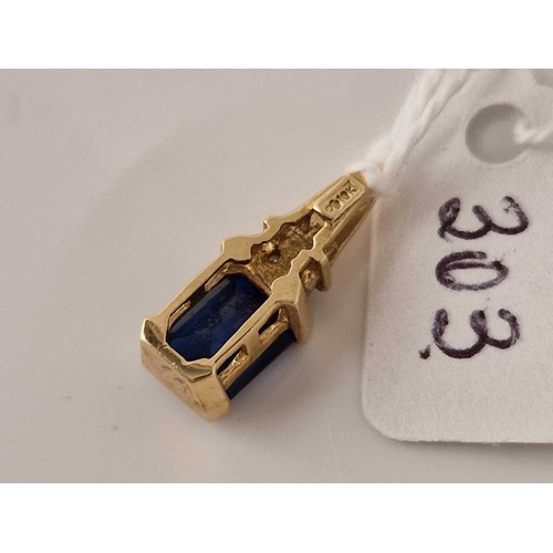 303 - A diamond and sapphire pendant 10ct gold